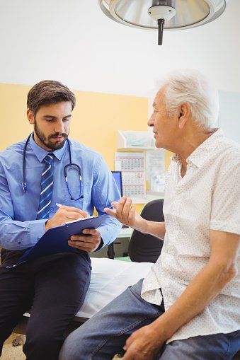 Patient Consulting a Doctor — Therapeutic Massage in Quakertown, PA Patient Consulting a Doctor — Therapeutic Massage in Quakertown, PA