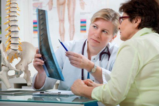 Doctor Explaining Medical Record — Chiropractic Clinics in Quakertown, PA