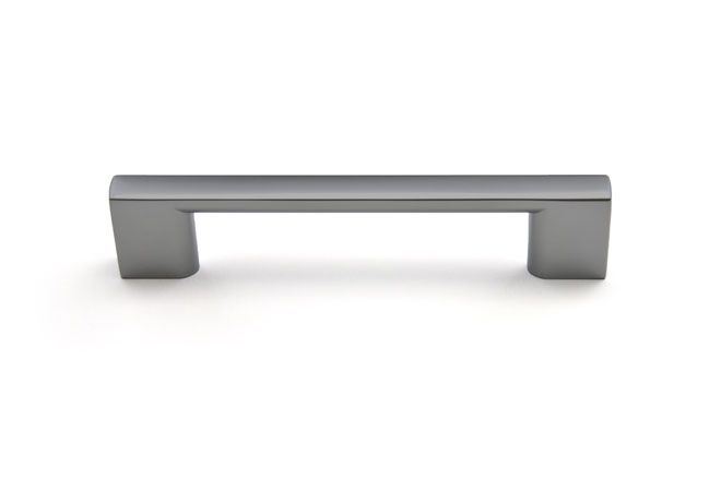 a stainless steel cabinet handle on a white background .