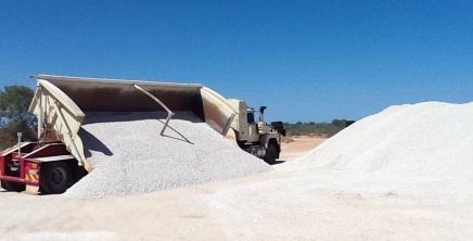 Sidetipper truck in action carrying pre-mixed contrete products in Exmouth