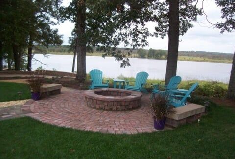 Vegetation Erosion Control — Fire Place Outside With Four Blue Chairs in Shacklefords, VA