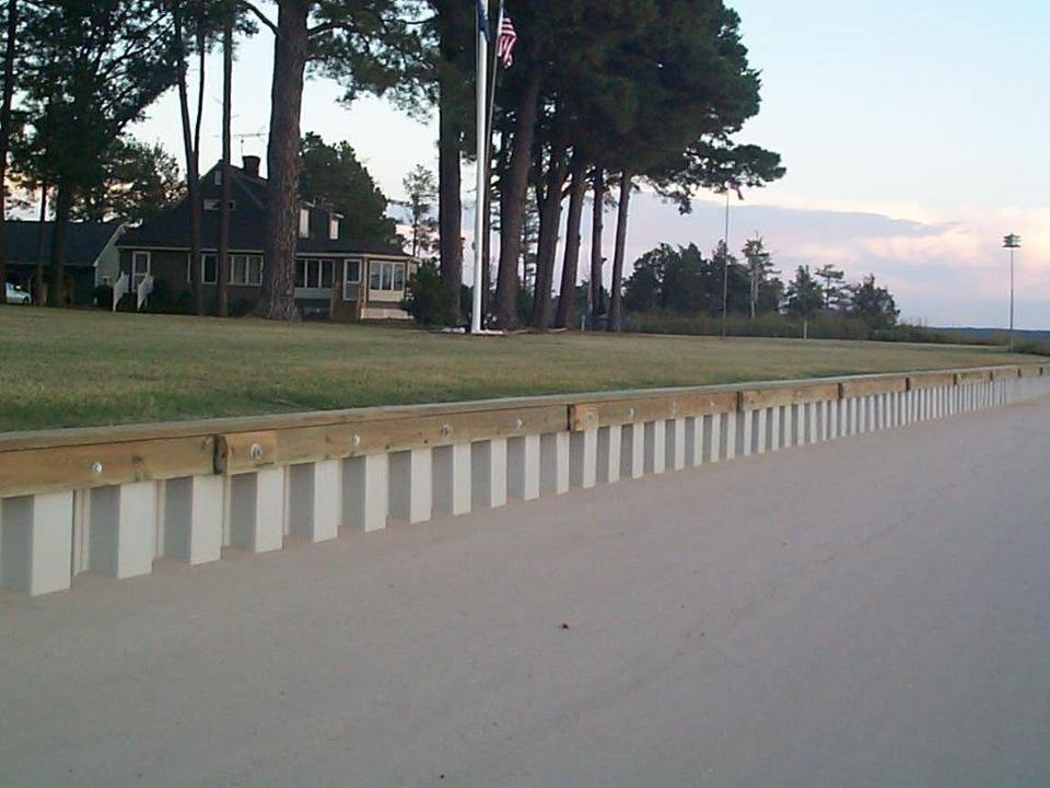 Land Clearing Installation — Seawall With Large House in Shacklefords, VA