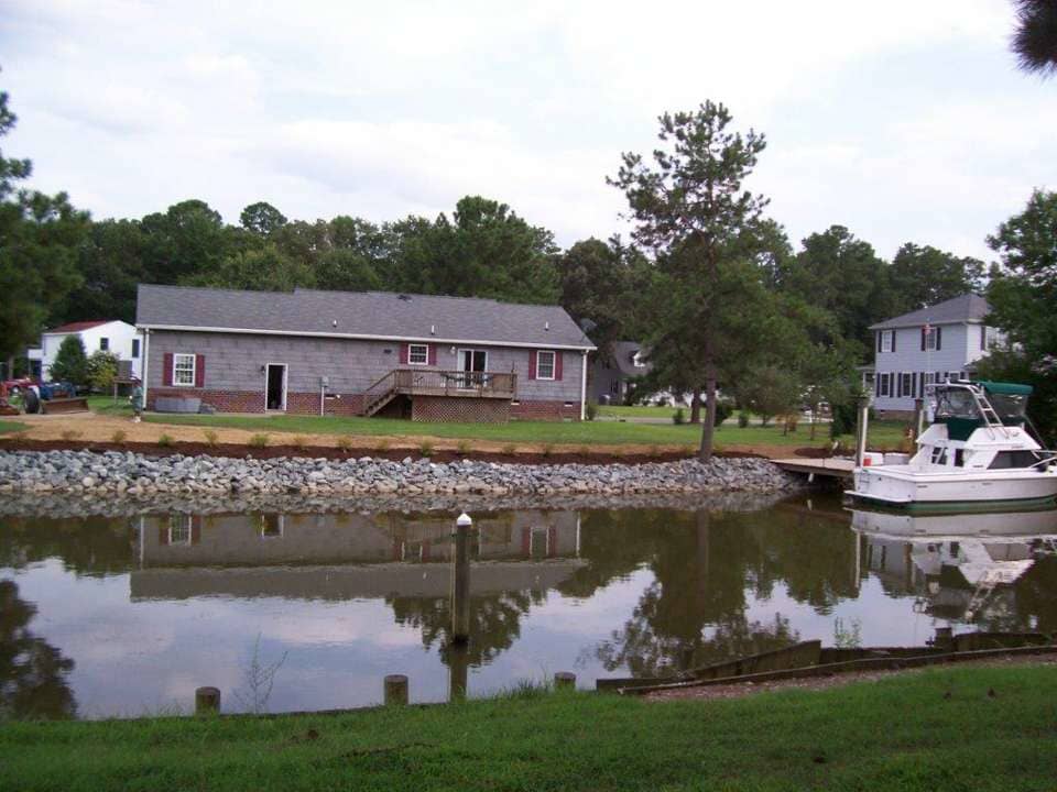 Slope Maintenance — Houses With Speed Boat in Shacklefords, VA