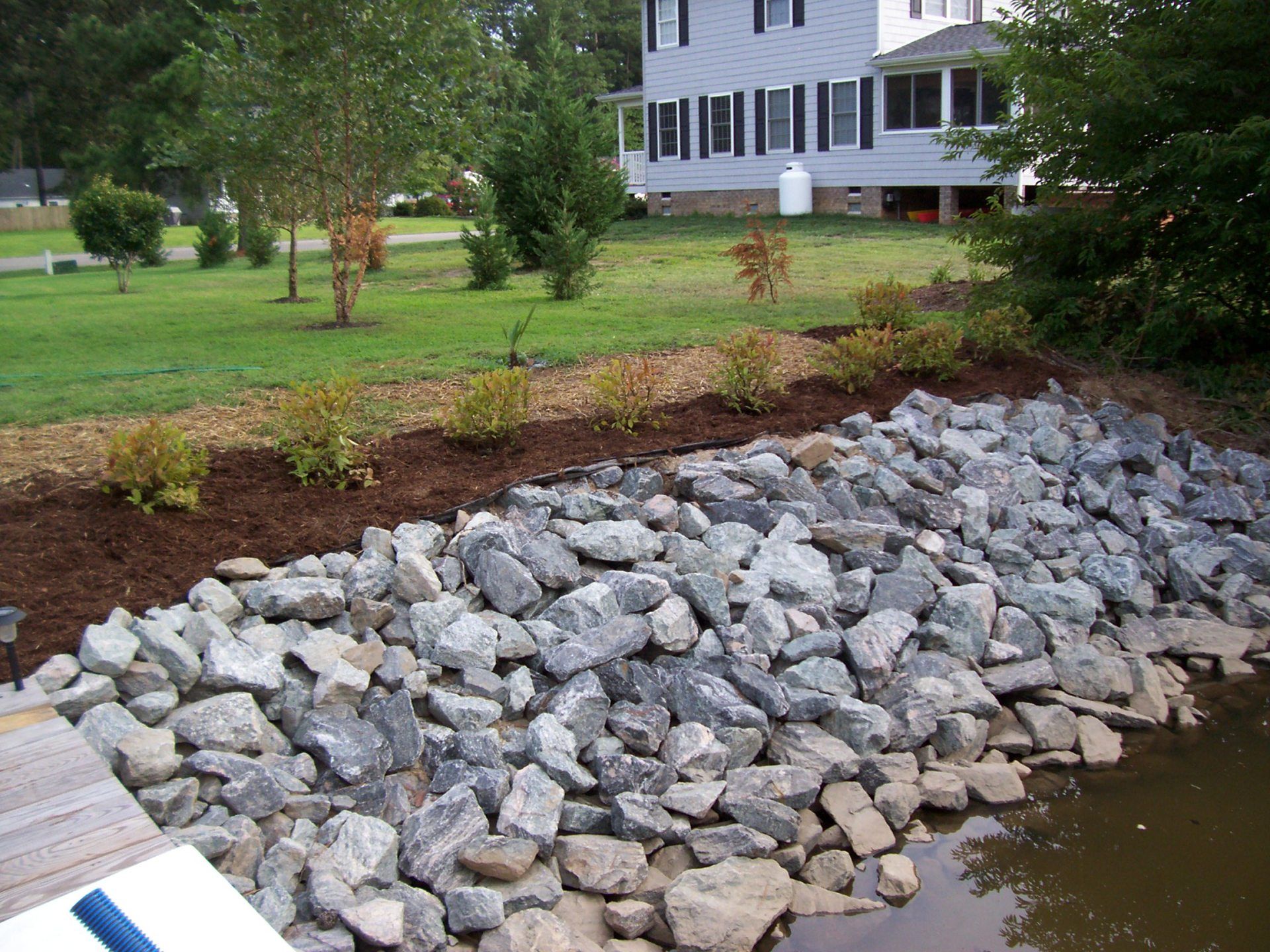 Drainage Utilities — Rip Rap With Plants On Top in Shacklefords, VA