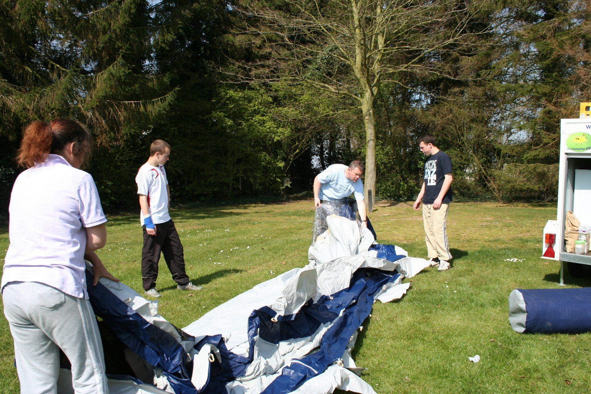 Back in the day photo of Go Camping UK in its infancy, putting up a tent.