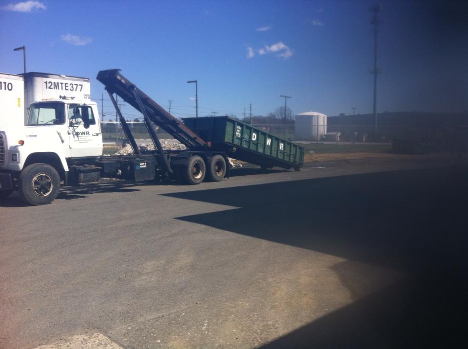 Waste Removal Roll-Off Truck — DWR Del Monte Waste Removal
