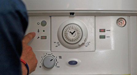A boiler being checked