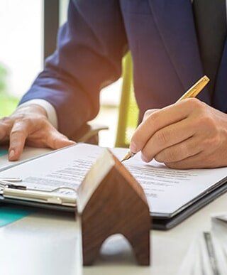 Client signing contract of insurance agency — Homeowner's Insurance in Merrillville, IN Client signing contract of insurance agency — Homeowner's Insurance in Merrillville, IN