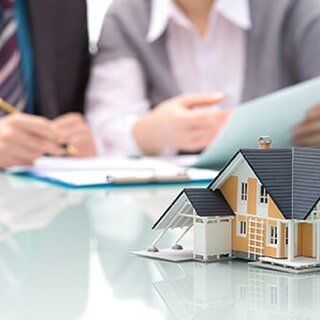 Agent and client talking about house — Property Insurance in Merrillville, IN Agent and client talking about house — Property Insurance in Merrillville, IN