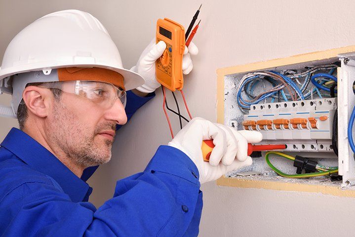 Installing Electrical Panel — Ogden, IL — MX Electric Installing Electrical Panel — Ogden, IL — MX Electric