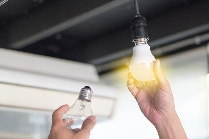 Installing the Light Bulb — Ogden, IL — MX Electric Installing the Light Bulb — Ogden, IL — MX Electric