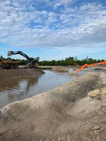 Landscaping with Small Pond and Waterfall — Fort Myers, FL — Conidaris Builders & General Contractors Inc Landscaping with Small Pond and Waterfall — Fort Myers, FL — Conidaris Builders & General Contractors Inc