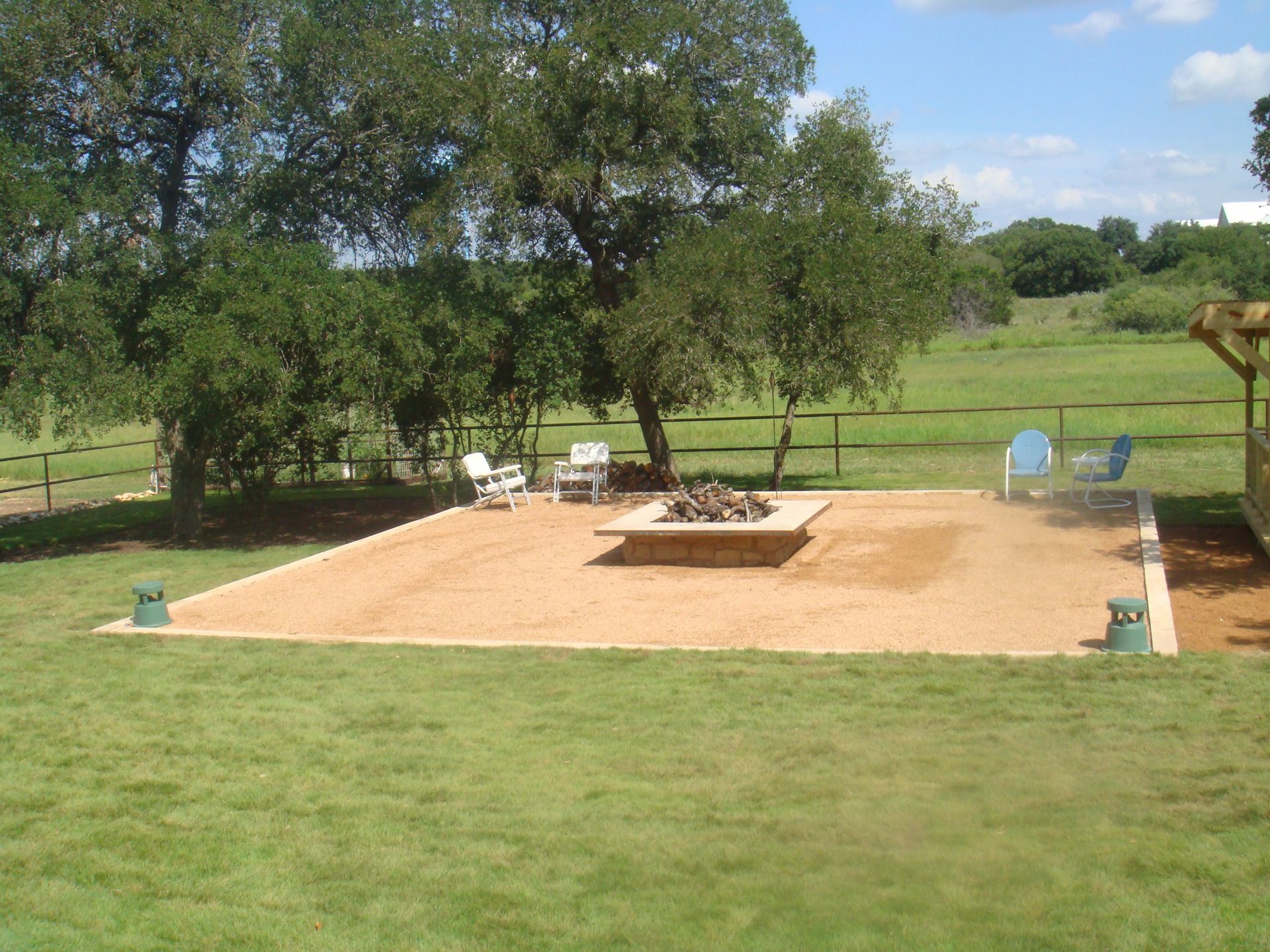 raised fire pit in sandy area