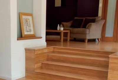 Steps up to living room sofa