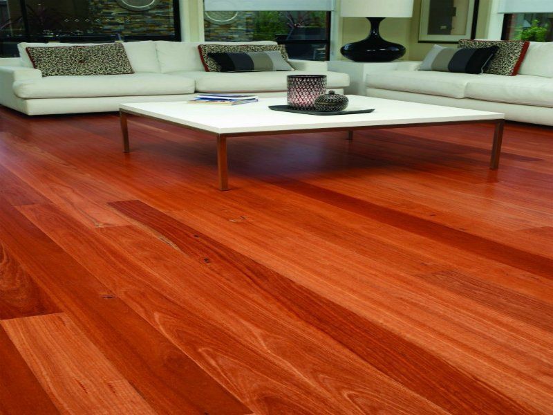 Red hardwood flooring in living room