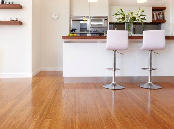 Polished light wood flooring.