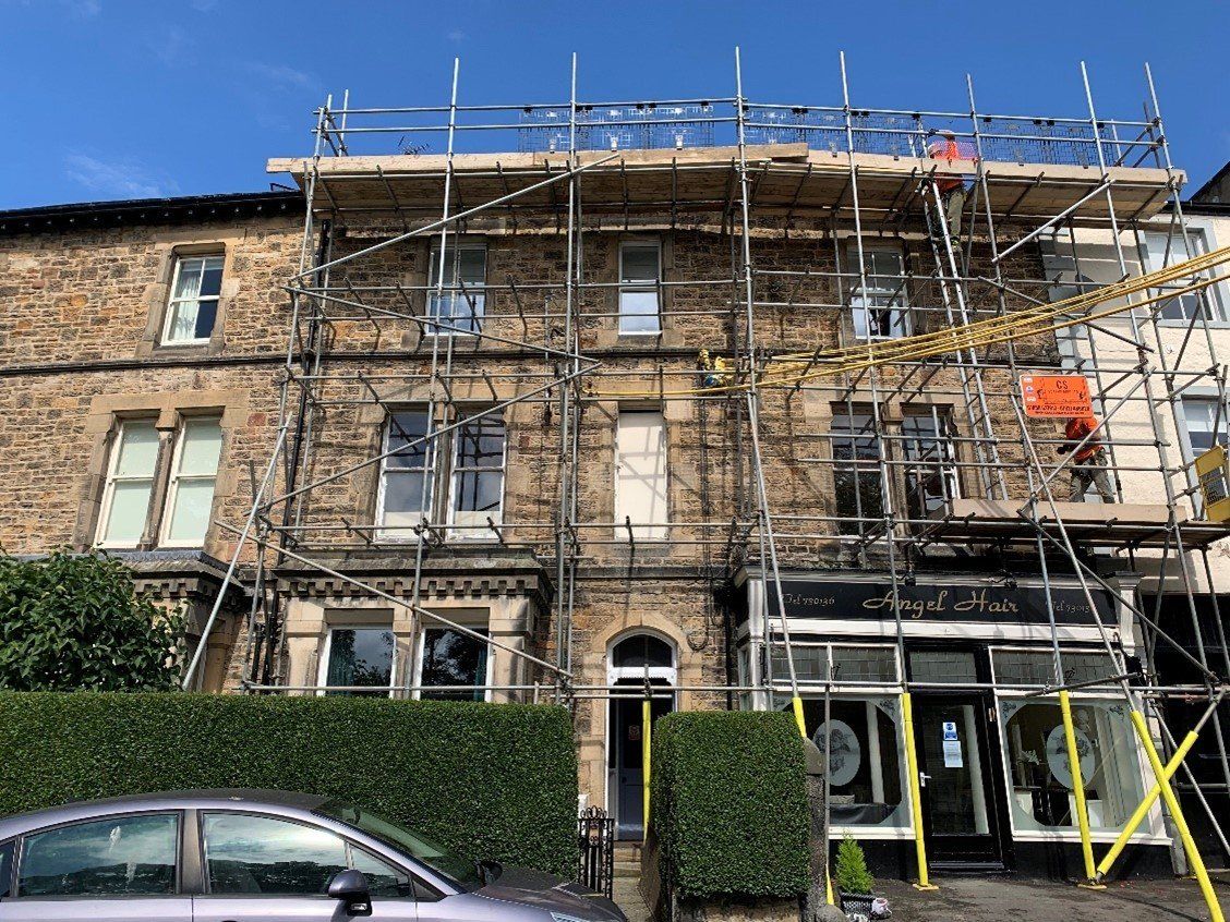 Dismantle of scaffold after the front had been re-rendered.