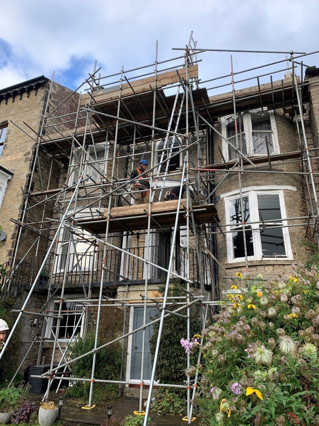 Scaffold for roofing works