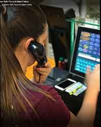 Girl Taking Order On Phone