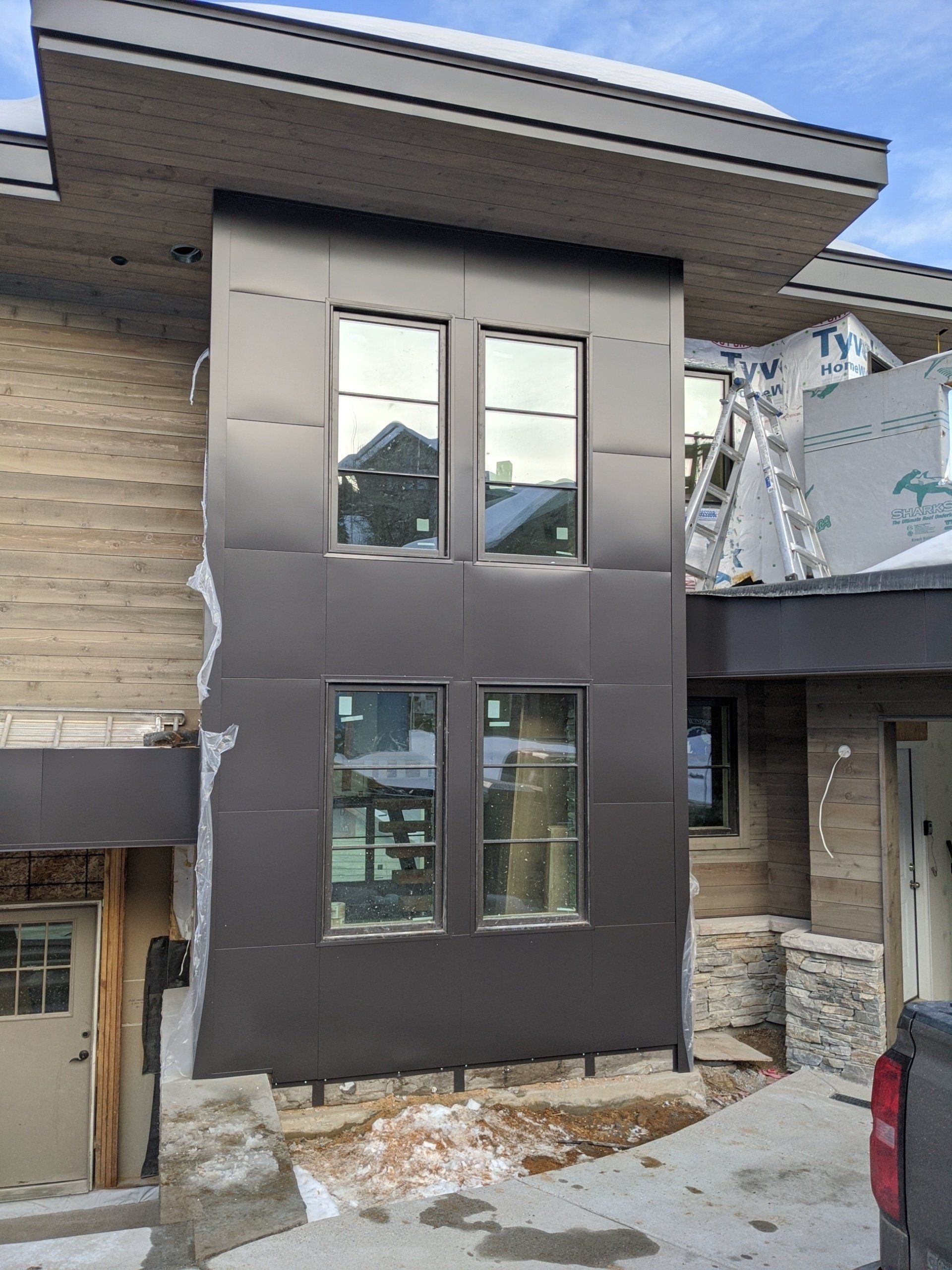 Black Wall with Tall Windows — Salt Lake City, UT — ACW Roofing