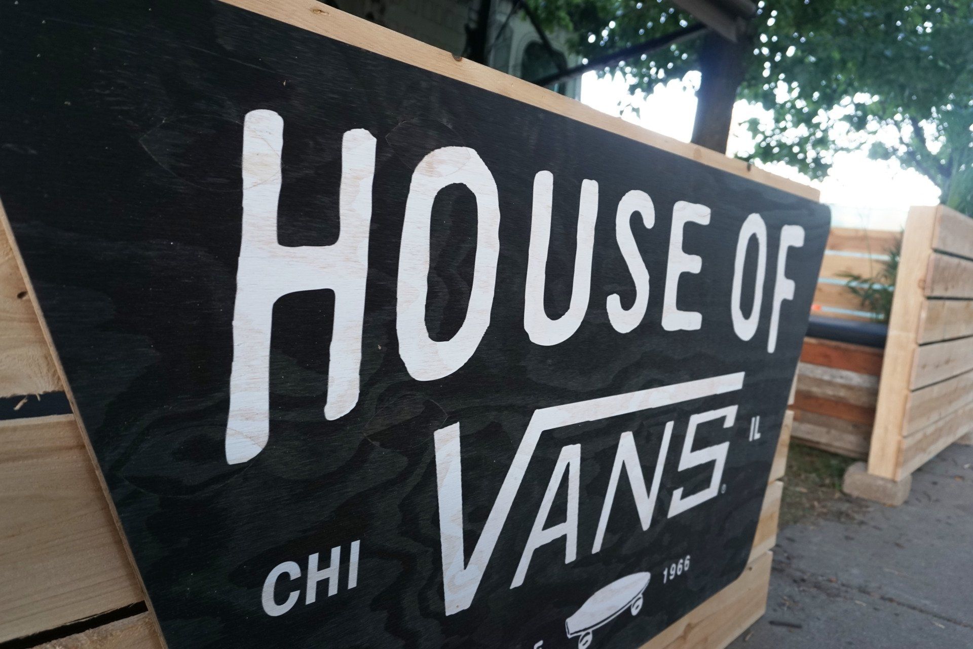 A sign that says house of vans on it