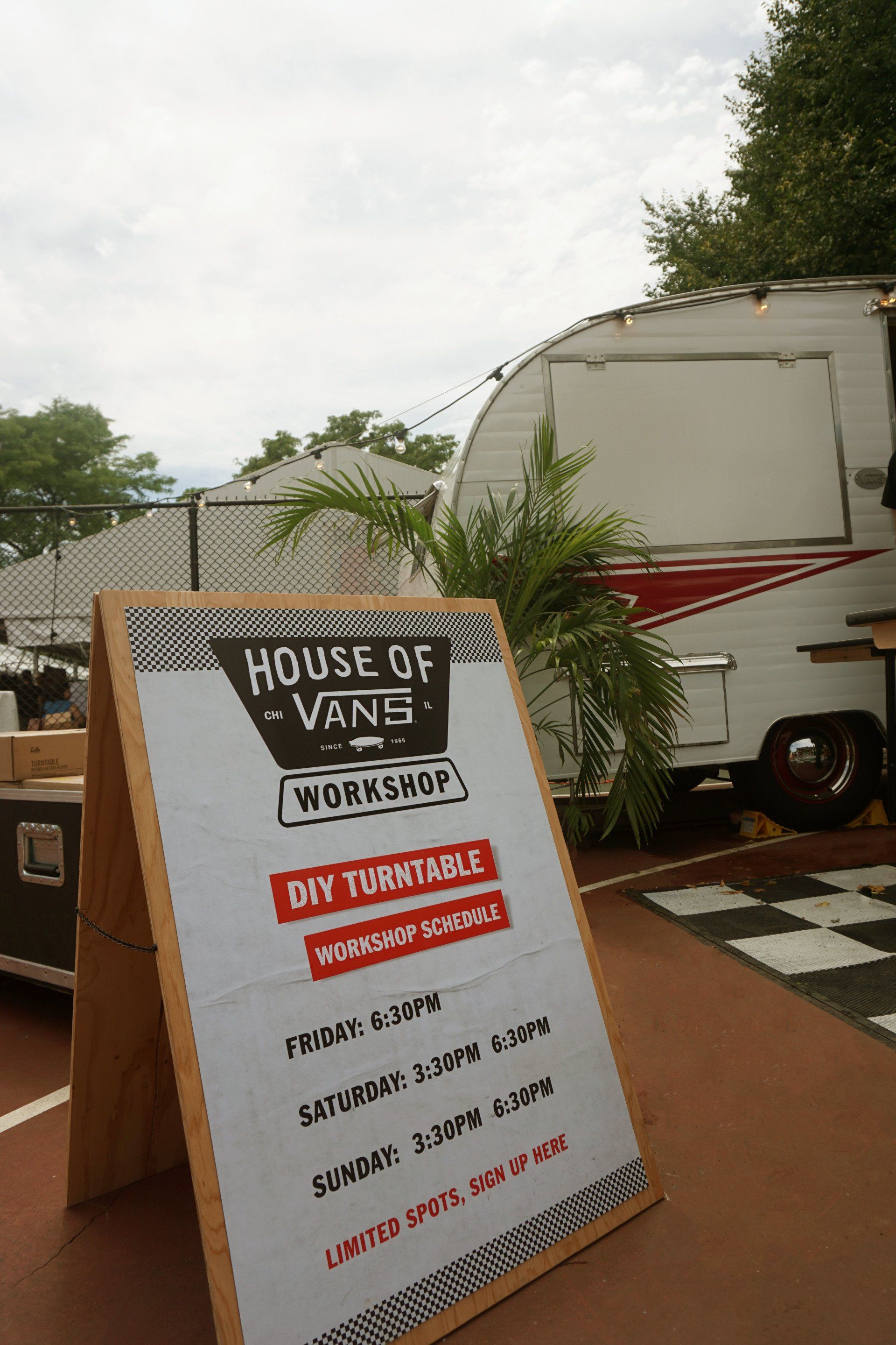 A sign that says house of vans on it