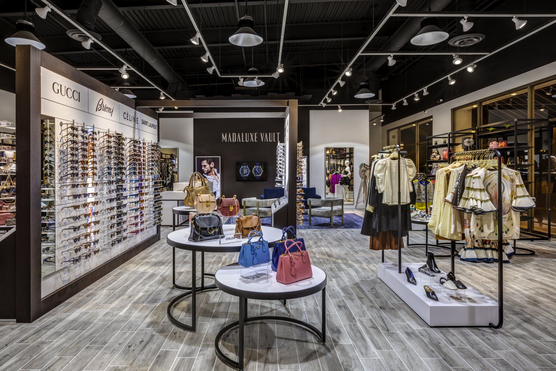 A store filled with lots of clothes and handbags.