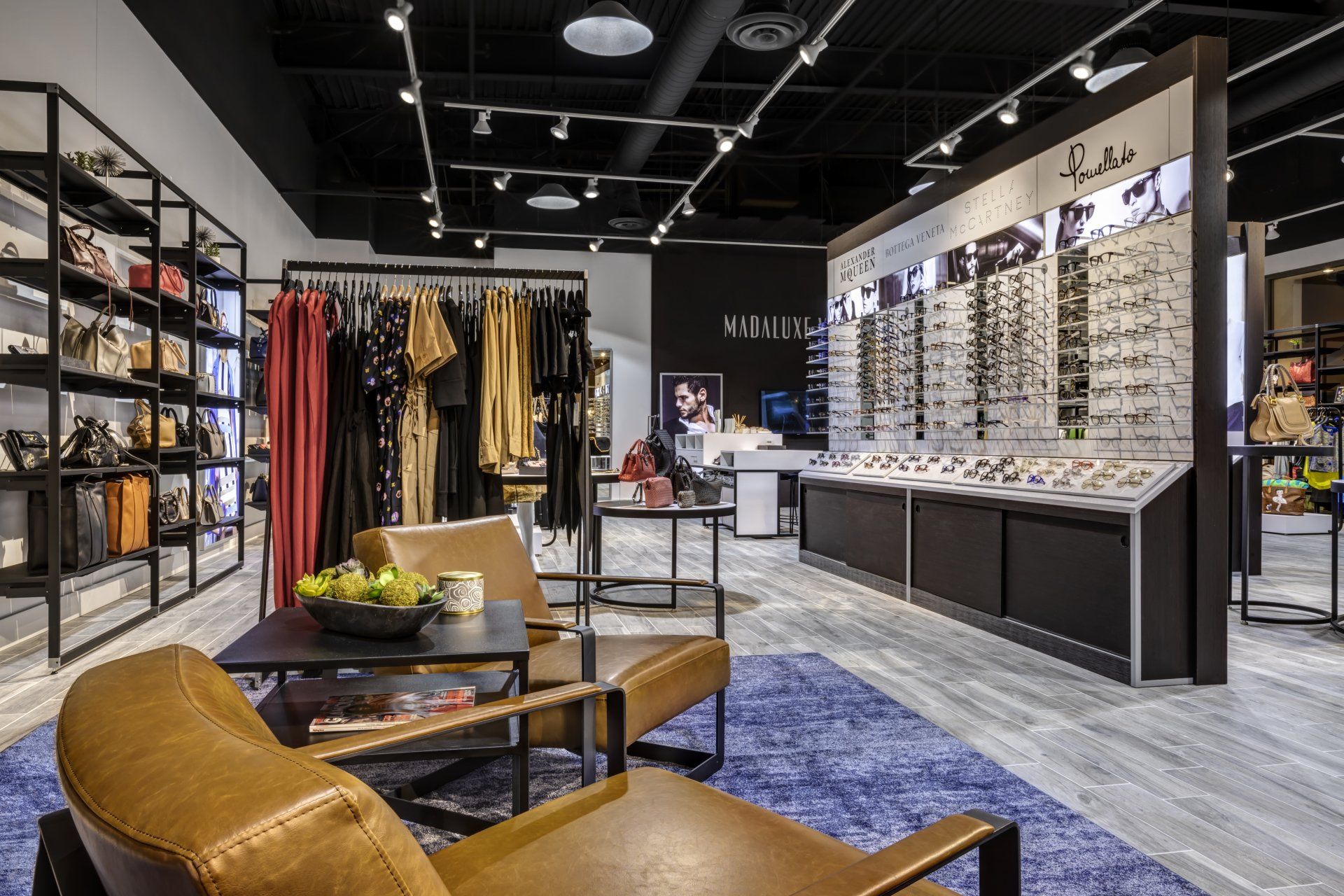 A store with a lot of furniture and clothes on display.