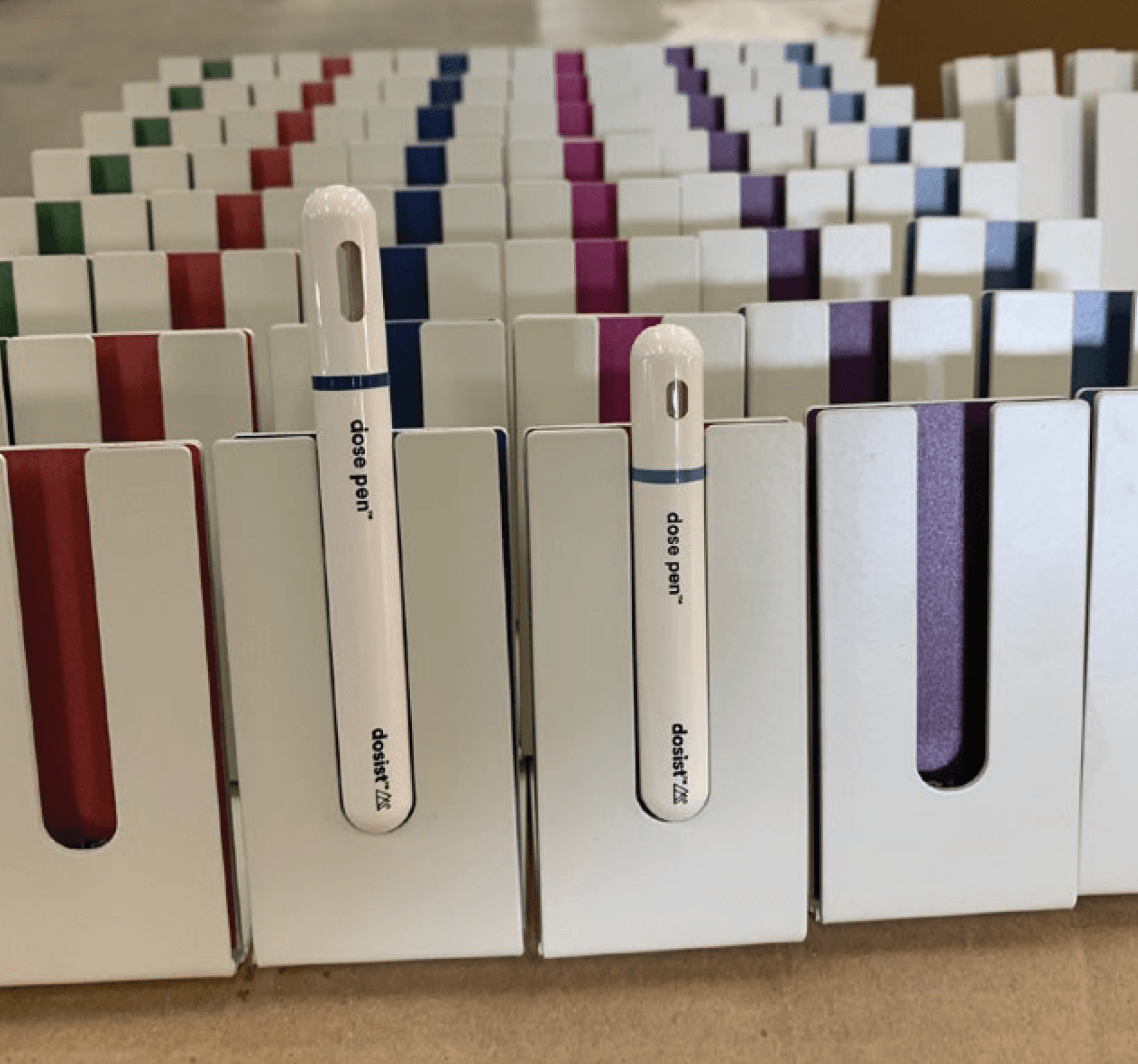 A row of dental pens with the word dent on them