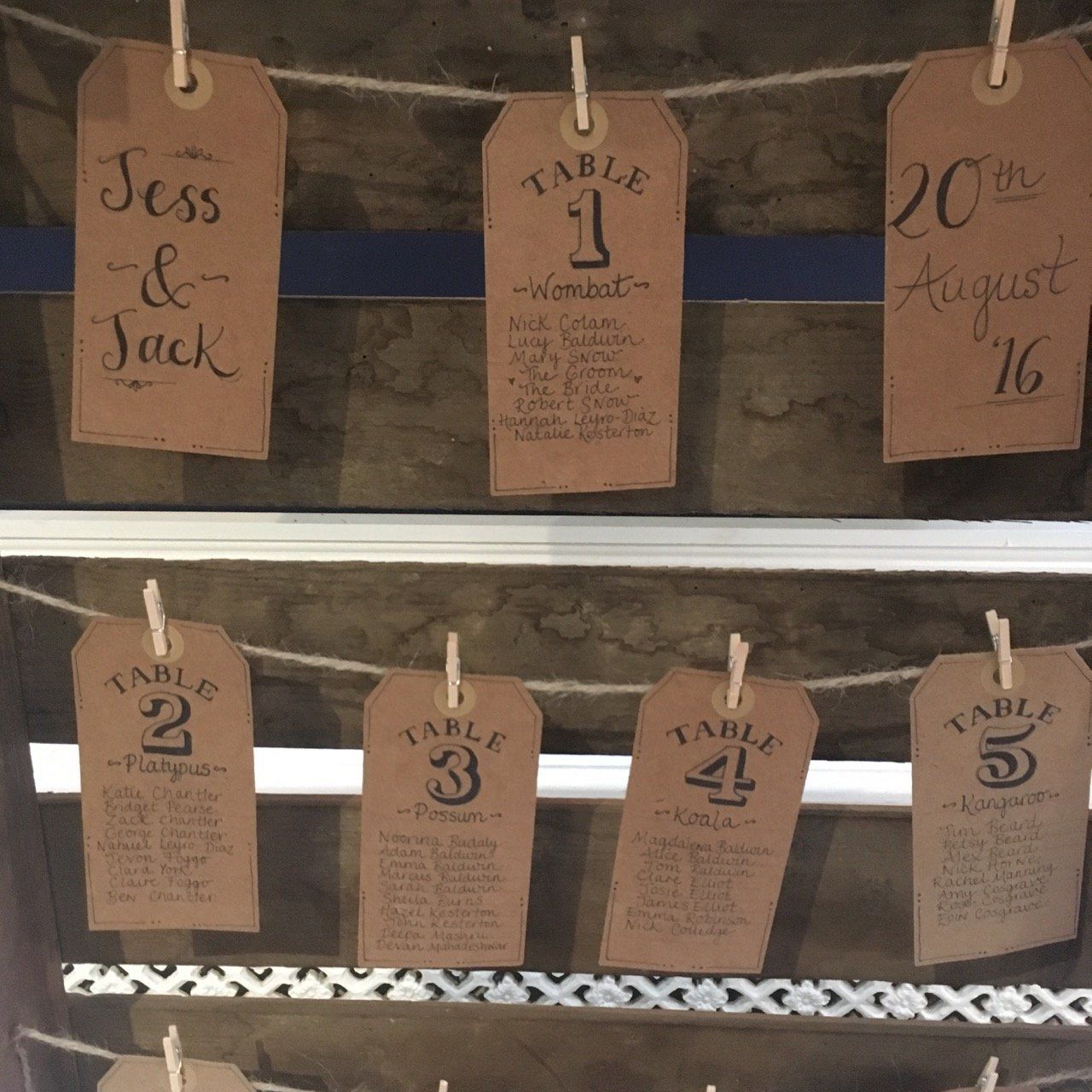 Seating cards for a wedding with the names jess and jack on them