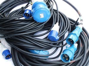 A bunch of wires with blue plugs on them
