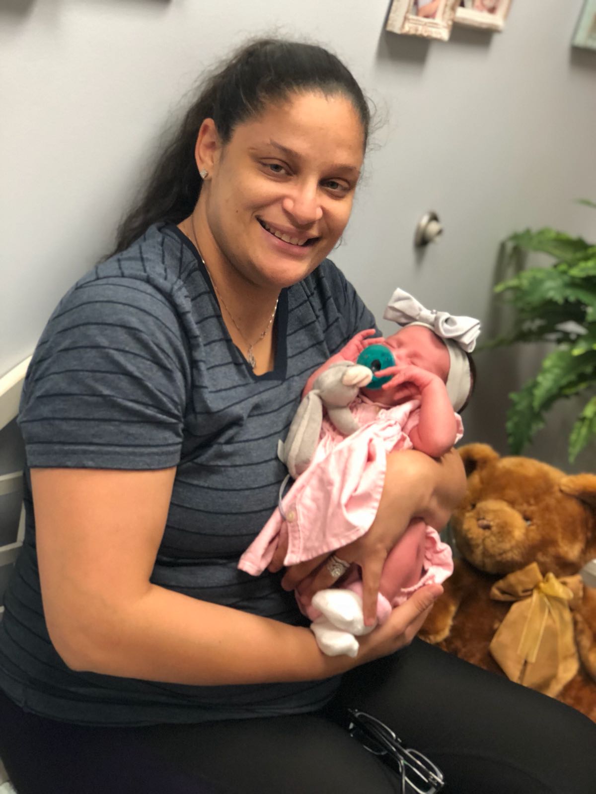 Baby with Gray Bow — Ocala, FL — All About Women OB/GYN Clinic