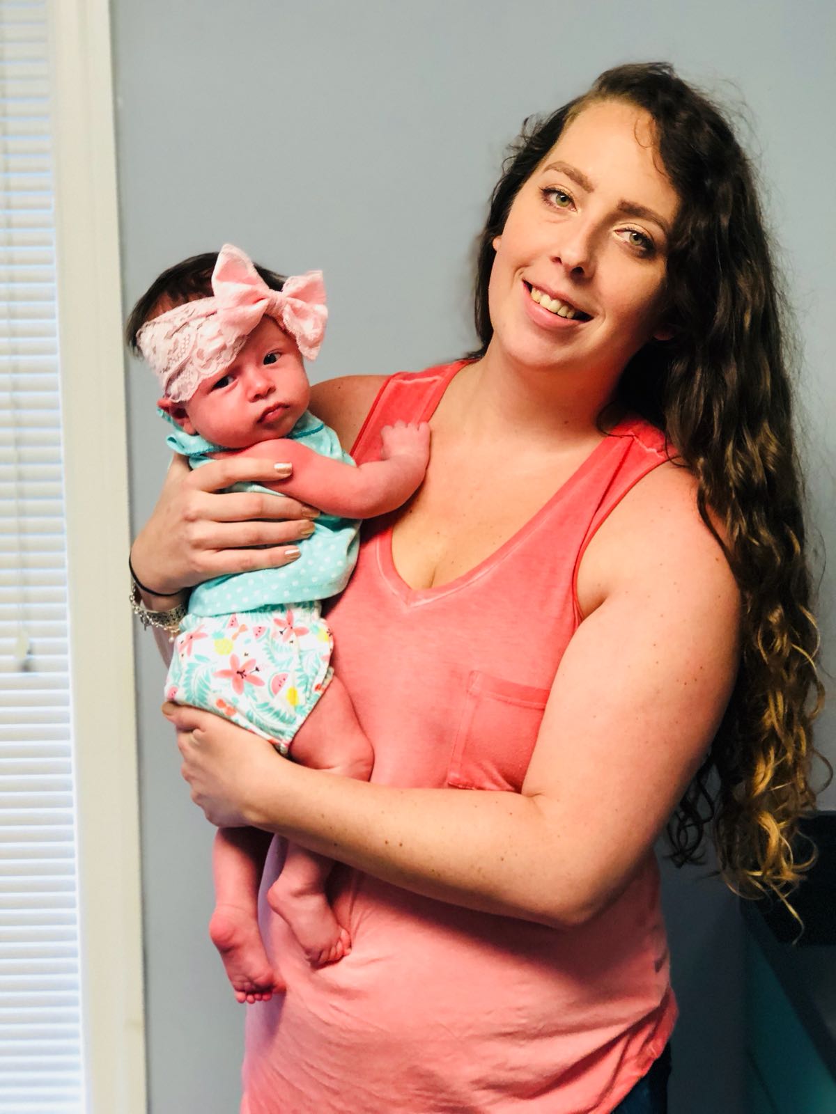 Infant with Pink Bow — Ocala, FL — All About Women OB/GYN Clinic