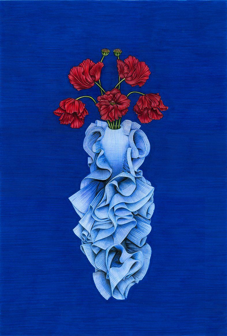 Blue vase of ruffled fabric with red flowers against a deep blue background.
