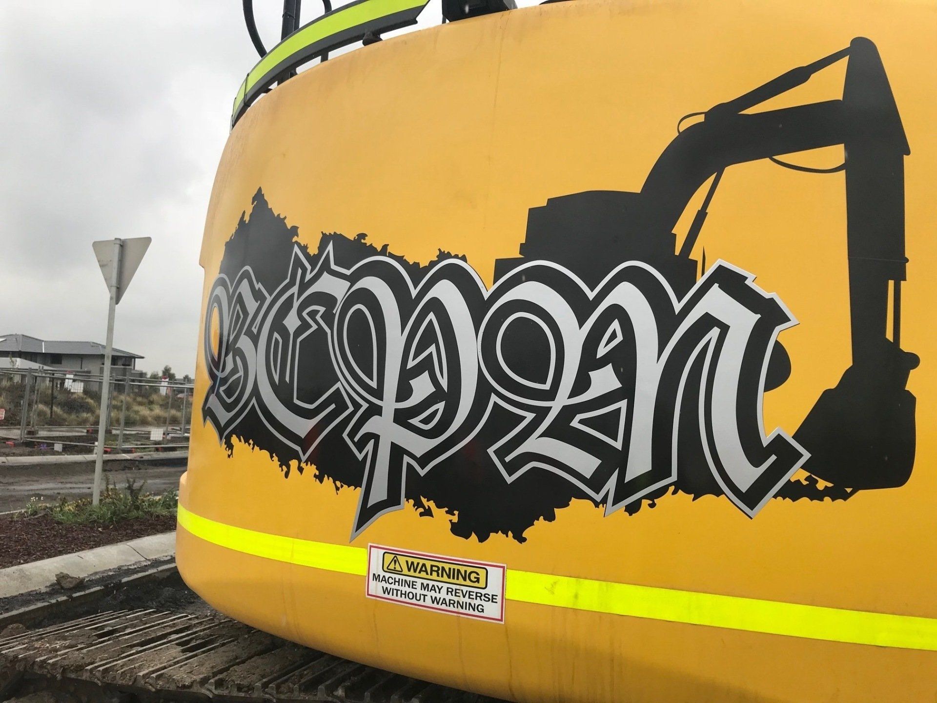 Yellow excavator with 