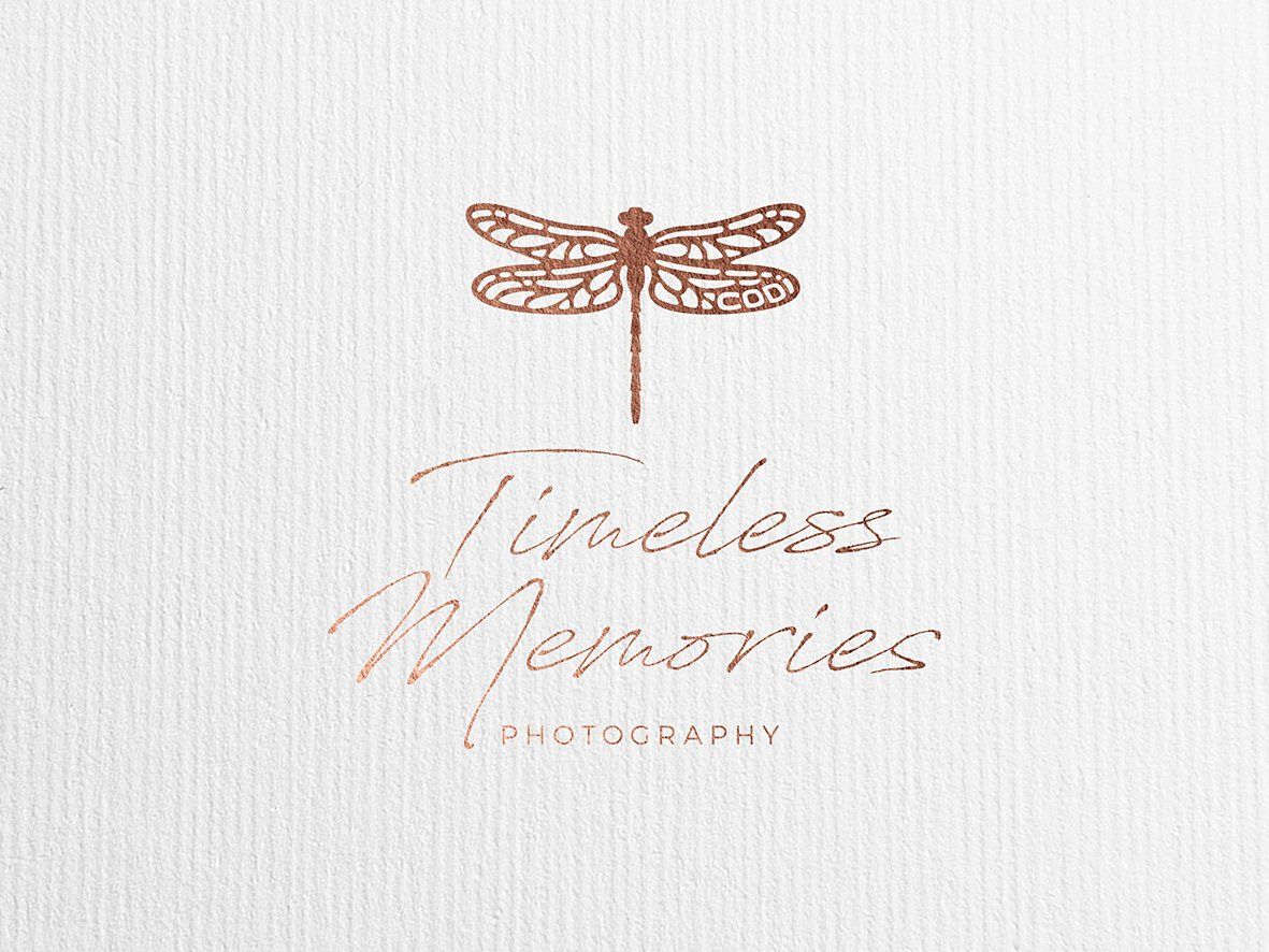 Rose gold dragonfly logo above cursive 