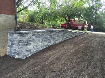 Home patio area overlooking beautiful landscaping—Custom Concrete & Concrete Services in Glenshaw, Pennsylvania Home patio area overlooking beautiful landscaping—Custom Concrete & Concrete Services in Glenshaw, Pennsylvania