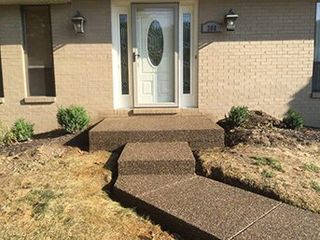 Home patio area overlooking beautiful landscaping—Custom Concrete & Concrete Services in Glenshaw, Pennsylvania Home patio area overlooking beautiful landscaping—Custom Concrete & Concrete Services in Glenshaw, Pennsylvania