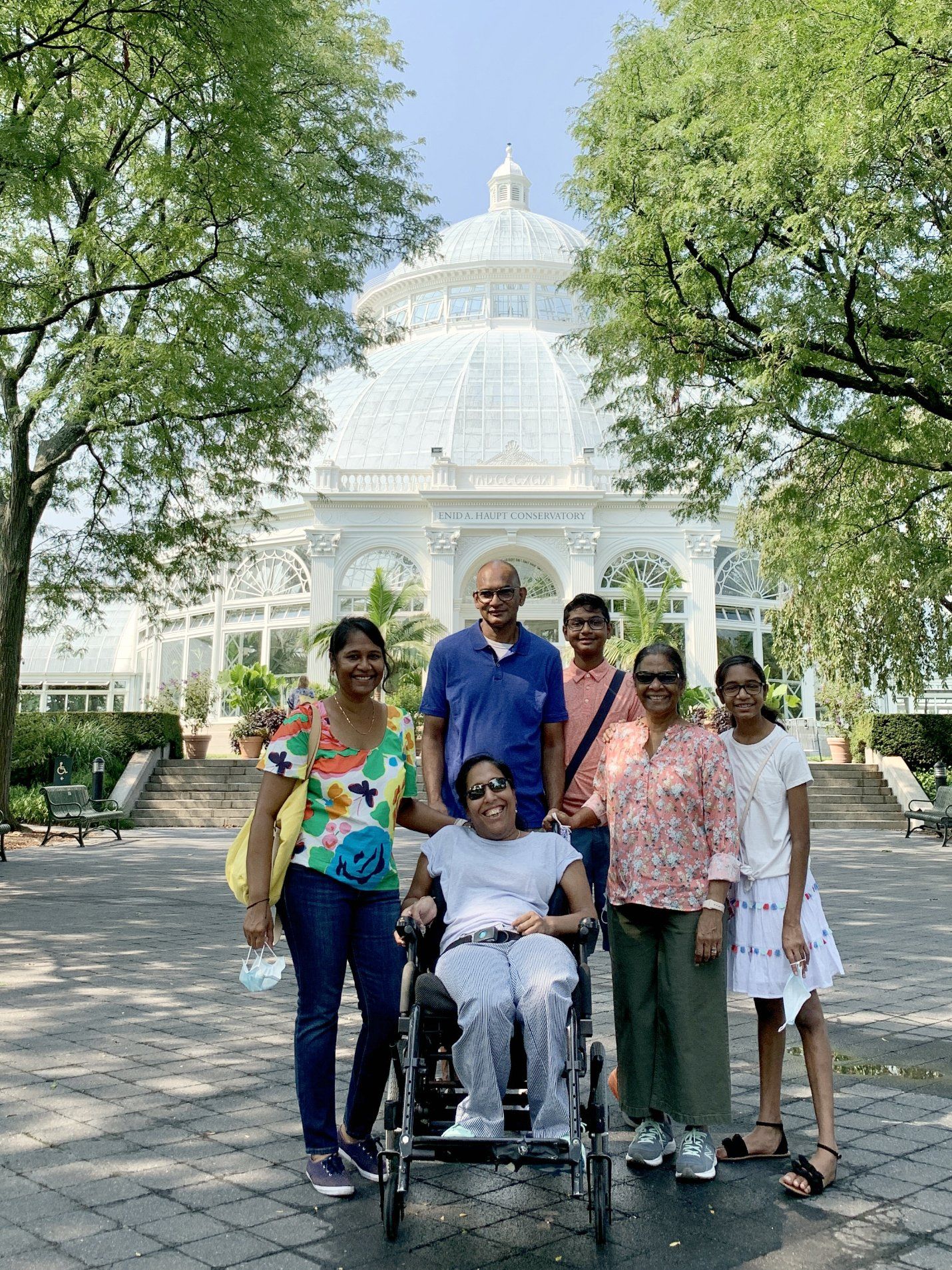 Family portrait with all of us smiling. NYBG Accessible Travel NYC Wheelchair Experience