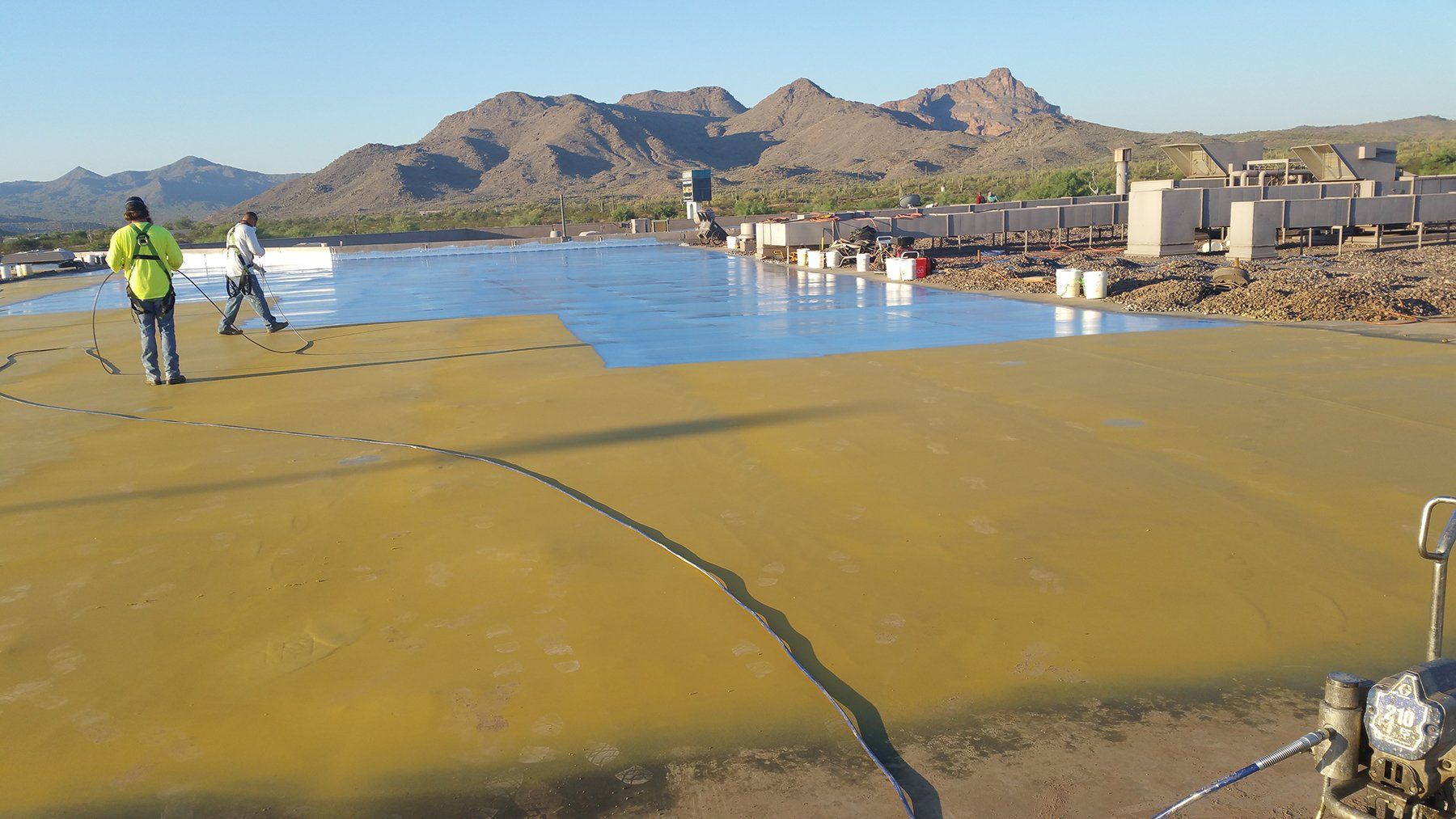 Combined fluid applied membrane (non breathable) with liquid applied roof coating.