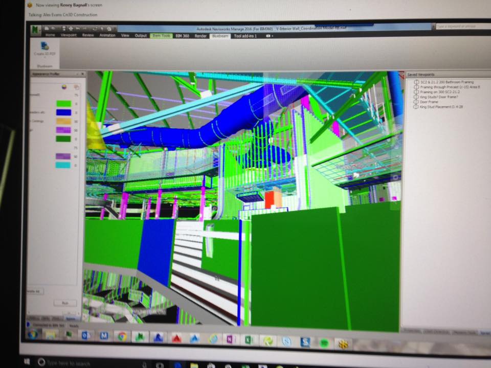 a computer screen shows a 3d model of a building