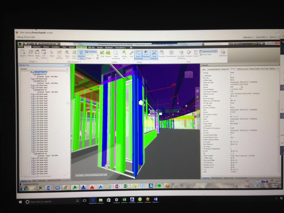 a computer screen shows a 3d model of a building