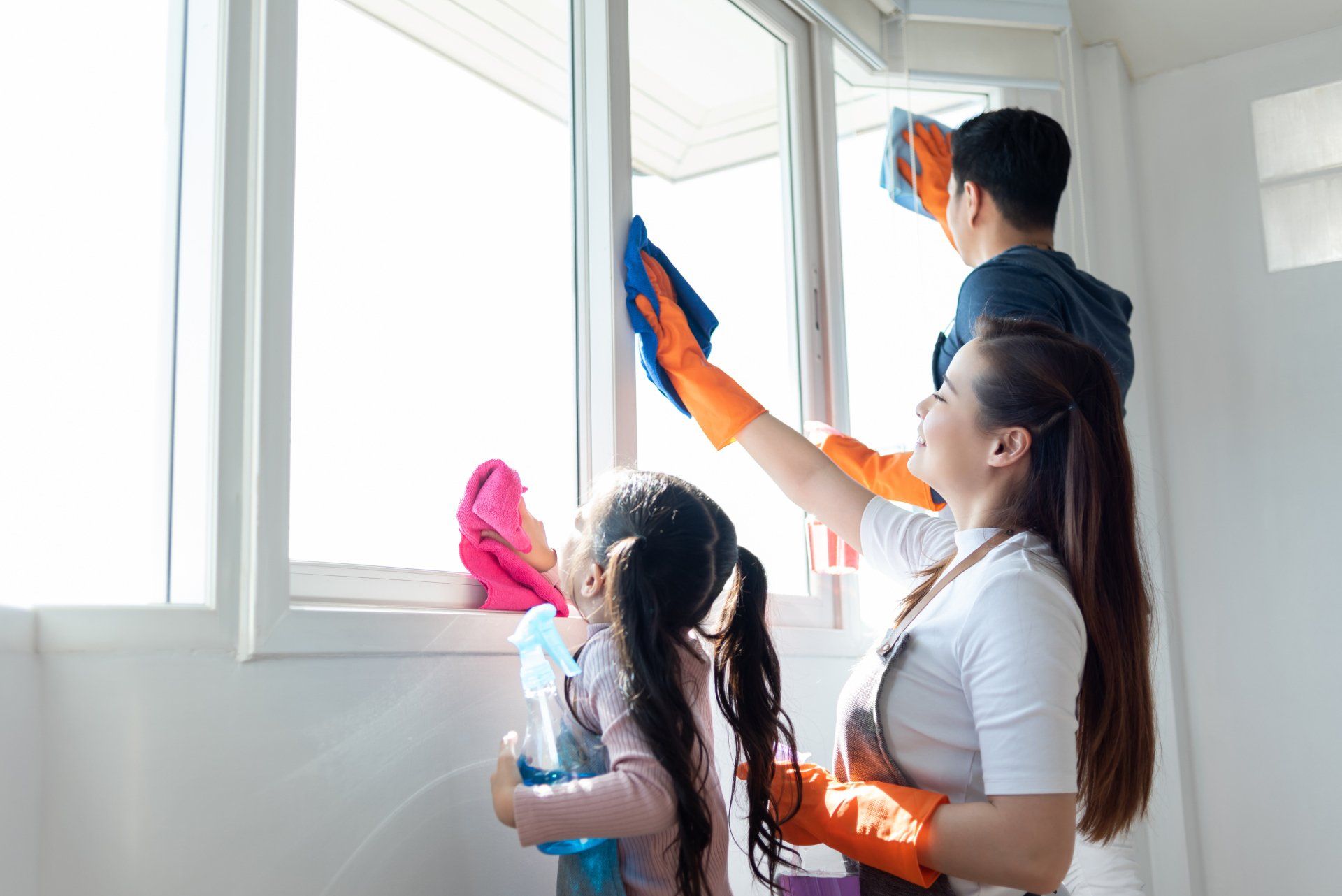people cleaning window