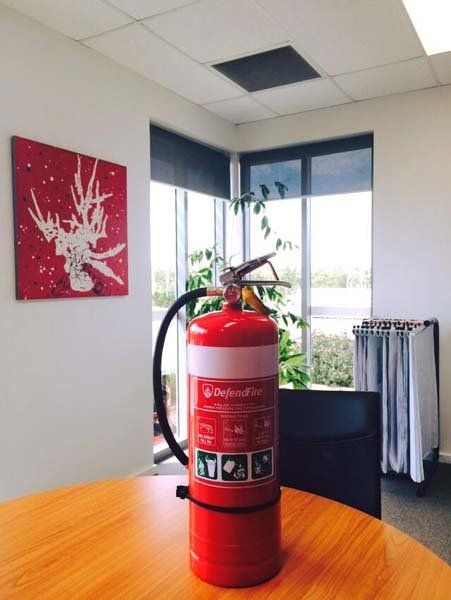 fire extinguisher on table