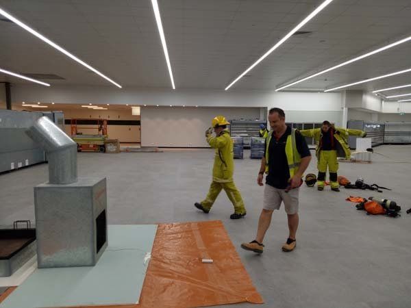 men walking in commercial building