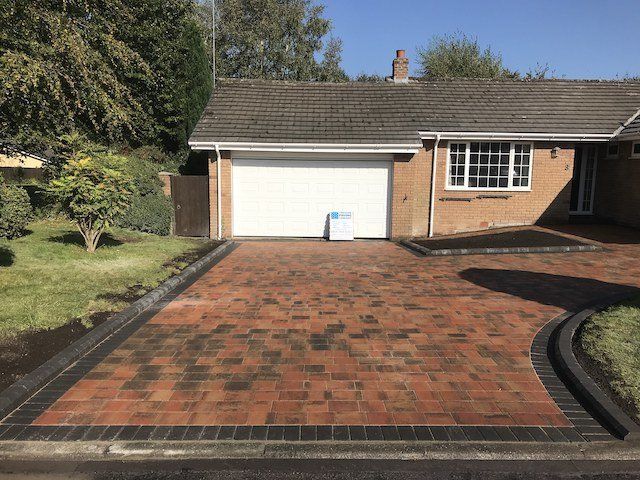 the brand new block paved driveway.