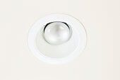 White recessed ceiling light with a round frosted lens