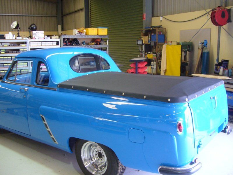 Read view of a blue color automobile