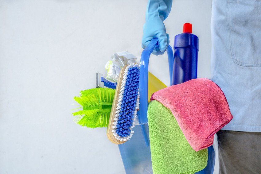Clean with tanks and cleaning products on a white background.