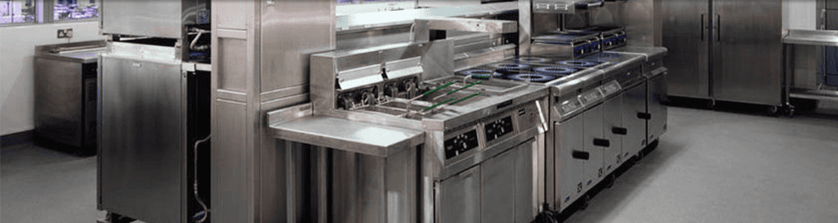 commercial kitchen area with all stainless steel units and cooking equipment commercial kitchen area with all stainless steel units and cooking equipment